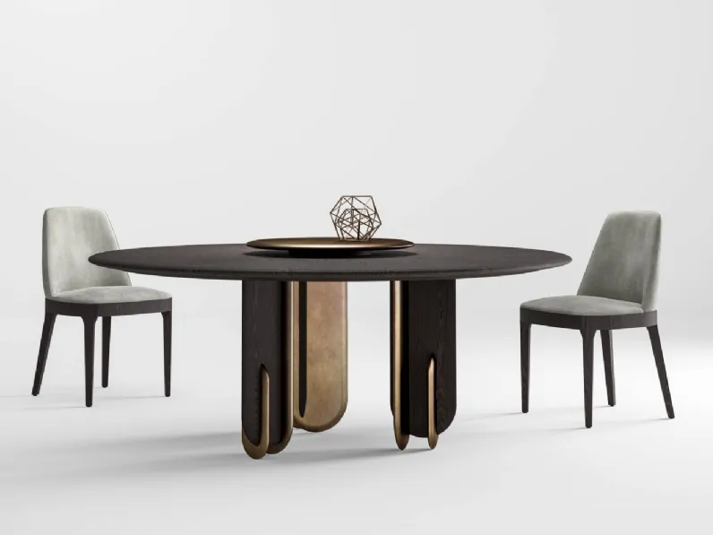 Tavolo rotondo con piano in legno e gambe in legno naturale e laccato bronzo Talento di Laura Meroni
